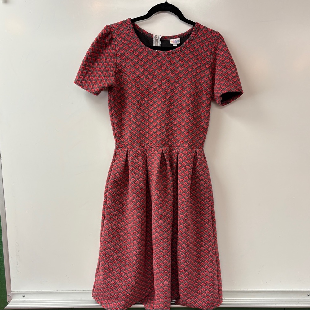 LulaRoe short sleeve, crew, neck line, fit, and flare silhouette.